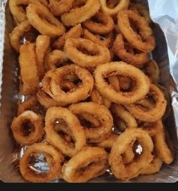 Freshly crumbed and fried calamari catering platter Freshly crumbed and fried calamari catering platter
