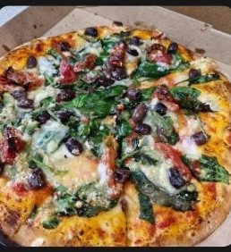Loaded vegan catering pizza from Belmonte's Loaded vegan catering pizza from Belmonte's